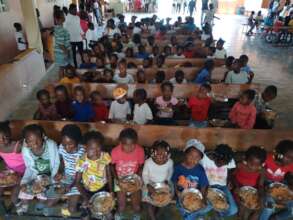 Many children gather for lunch