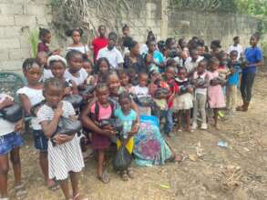 Children receiving food to take home