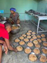 Food is cooked and served to the children