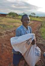 The Posho Mills first customer