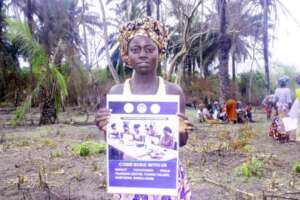 A proud woman farmer standing on the future site