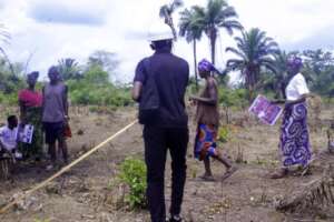 Engineer is taking land measurements