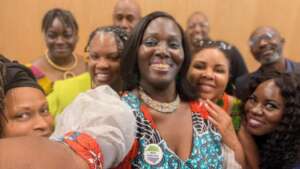 Dr. Adama & Attendees at Threads of Impact Event