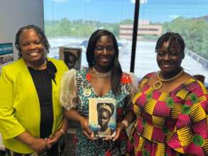 Dr. Adama & Attendees at Threads of Impact Event