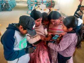 Women and children learning together.