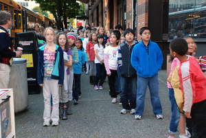 Students line up outside the theater