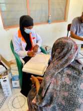Nurse clerking the patients in the outreach