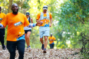 Aaron running through the forest trails, every ste