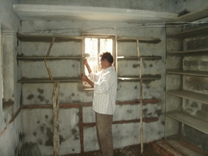 Masonry work is being done inside the house