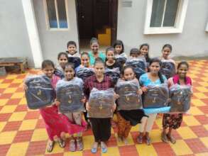Sphoorti Children with their school kits