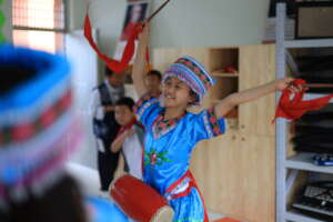 Minority girls dancing in the music classroom