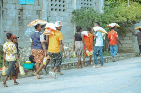 Provide food packages and drinking water in Haiti