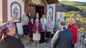 Talking with Bukovets' Village elders after church