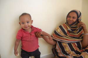 Mahir with his mother with healed cleft lip.