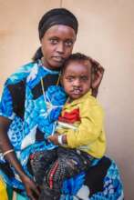 Mother and baby awaiting treatment