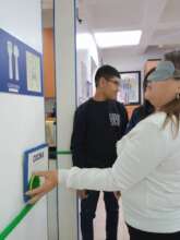 Simulation of a deafblind person taking a tour in