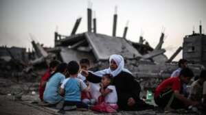 palestinian family breaks fast amidst rubble