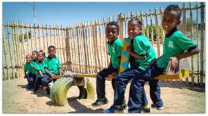 Girls and Boys Playing see-saw