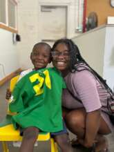 Two children who received beds