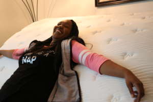 Warehouse client Ramona on her brand-new bed!