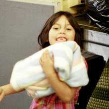 Girl with her new blanket from the Warehouse