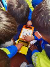 Children learning about AED use