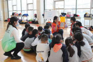 Children gather to learn safe first aid