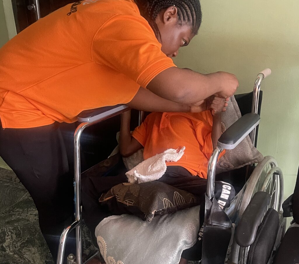 A caregiver attending to a child