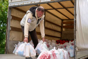 Aid distribution in a village near Kharkiv