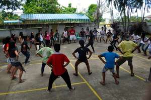 The group doing warm up exercises