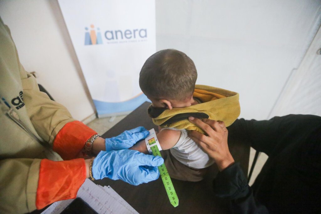 Gaza clinic staff also monitors young boy's growth