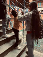 Special Educator teaching colours to child M*