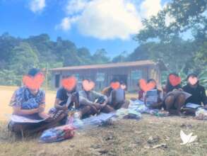 Lao girls receive stationary bag from AAT
