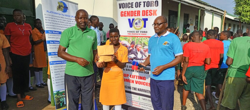 PLANE Hands over fees for two terms to a girl