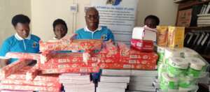 PLANE Staff Sorting Out Items For Children