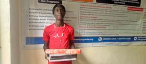 Student Receives items at our office.jpg