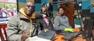 PLANE officialsdoing a radio talkshow