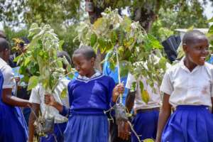 Girls Happy to Participate in Tree Planting