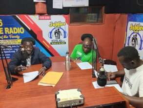 Our Team and District officials talking about HIV