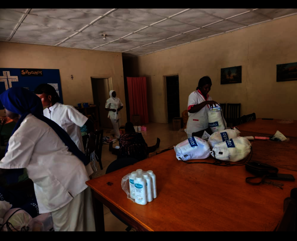 Dr. and Nurses filling the baby bags