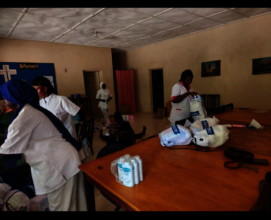 Dr. and Nurses filling the baby bags
