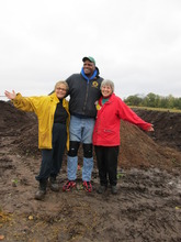 Jacque, Will Allen, and Karen on the compost pile