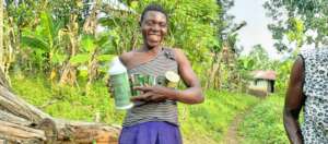 Happy Mother Receives Seeds for planting