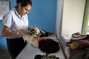 Looking through weavings from our partner artisans