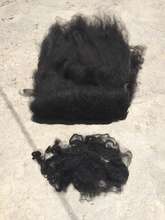 Black alpaca before and after carding
