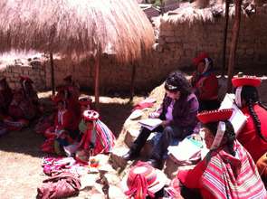 Discussing textile specifications with weavers
