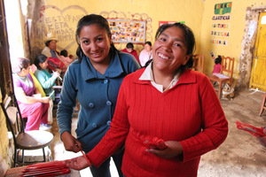 Knitter Rosa, right, with staff member Silvia