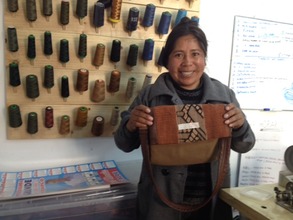 Estela with a leather bag