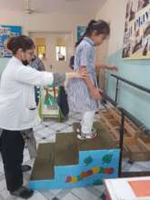 A standing frame made for a child by our trainer