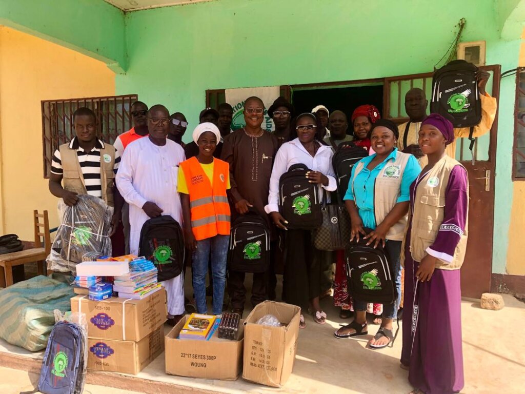 Presenting Supplies to the Delegate of Education